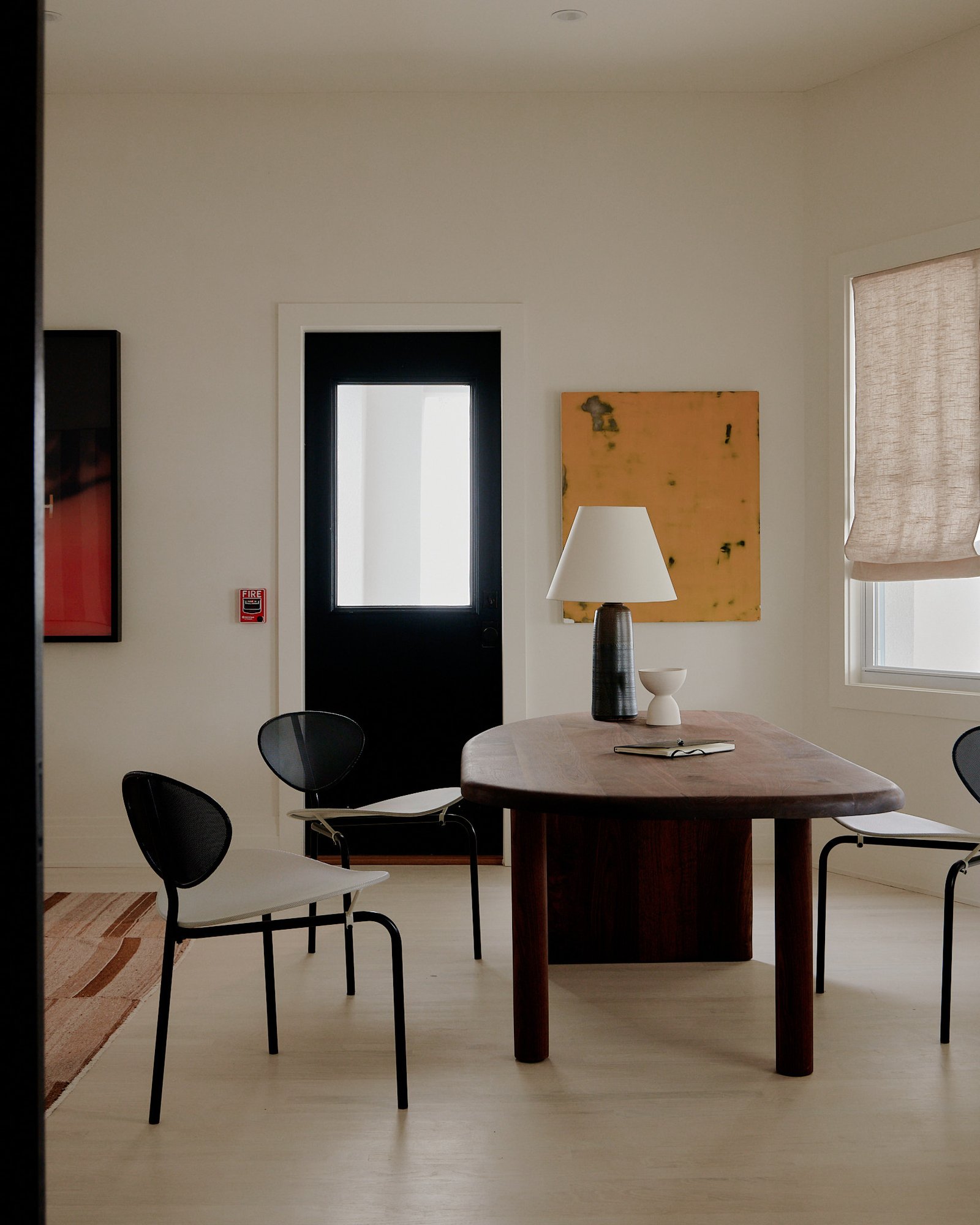 Team workshop setting featuring calm coastal interiors and composed workspace design.